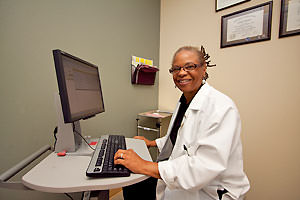 Physician at computer